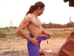 Outdoor gay strip for muscled long hair men lovers